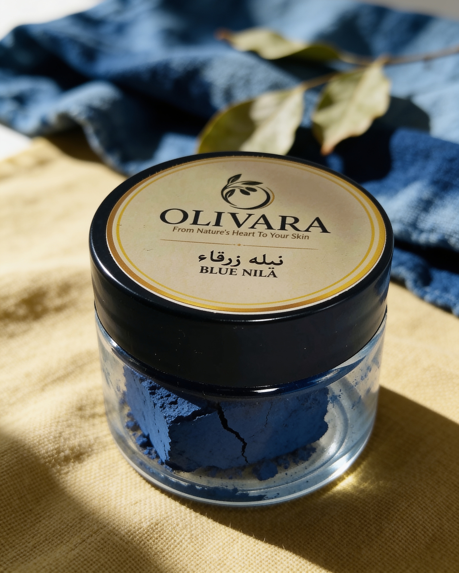 Olivara Blue Nila stone jar with indigo-dyed cloth Olivara Blue Nila stone jar with indigo-dyed cloth | برطمان حجر النيلة الزرقاء من أوليفارا مع قماش مصبوغ بالنيلة